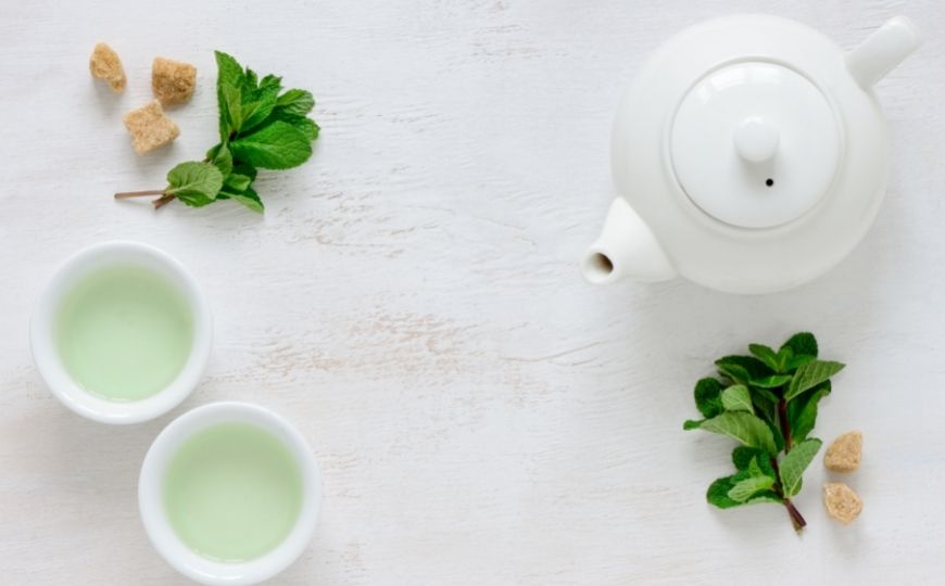 Put green tea bags on your eyes for healthy eyelashes Two cups of green tea and a teapot