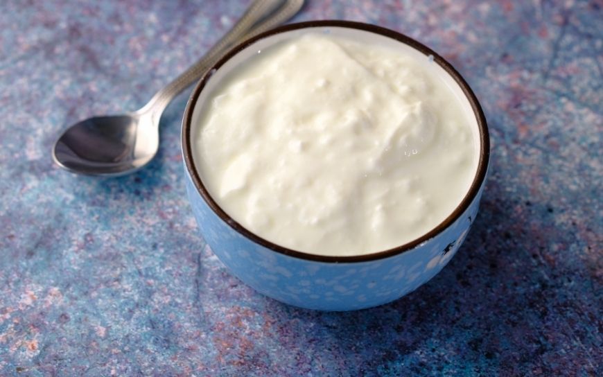 Hair mask with yogurt, honey and coconut oil A bowl with yogurt