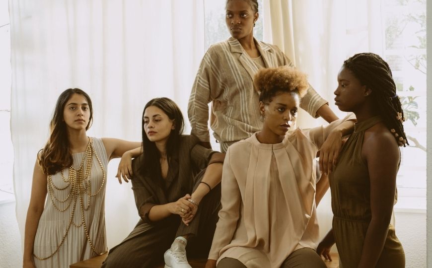 What are the 5 basic skin types?  5 Women posing
