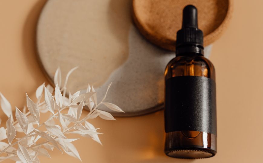 A bottle with beauty oil