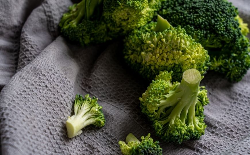 Pieces of broccoli on a towel