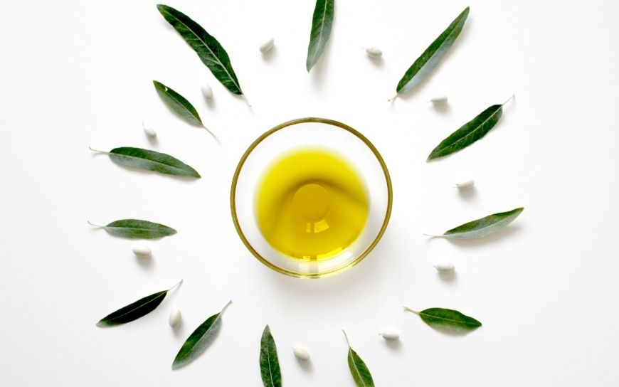 olive oil and olive tree leaves